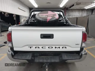 2022 Toyota Tacoma SR with VIN 3TMCZ5AN5NM480311, listed as a IAAI auction lot 42542600 with 43,297 mi miles and . Bid and sale history available at DreamBid. Image 17.