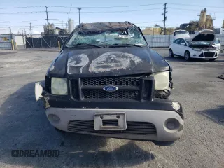 2003 Ford Explorer Sport XLS z VIN 1FMYU60E93UC12832, wystawiony jako Copart lot #71596394 z przebiegiem 197 215 mil mil oraz Szkody całkowita. Historia ofert i sprzedaży dostępna na DreamBid. Obrazek 5.