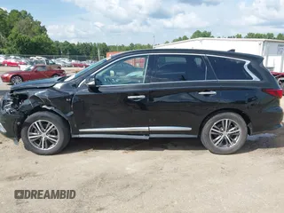 2016 Infiniti QX60 with VIN 5N1AL0MN7GC512506, listed as a IAAI auction lot 39811733 with 186,804 mi miles. Bid and sale history available at carsss.com. Image 14.