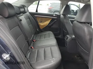 2009 Volkswagen Jetta SE with VIN 3VWRZ71K59M055735, listed as a Copart auction lot 60202485 with 160,196 mi miles and Salvage title. Bid and sale history available at DreamBid. Image 10.