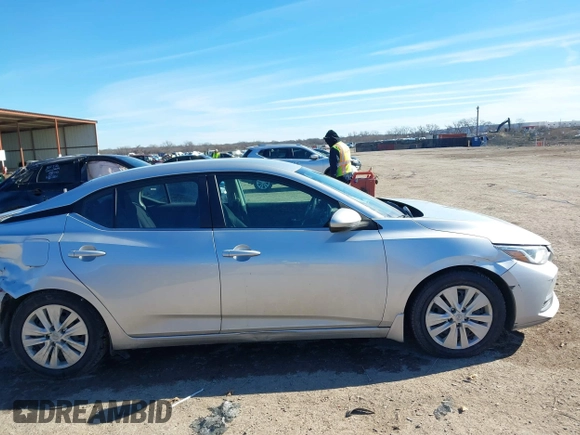 2021 Nissan Sentra S z VIN 3N1AB8BV5MY309466, wystawiony jako IAAI lot #41271437 z przebiegiem 46 838 mil mil oraz . Historia ofert i sprzedaży dostępna na DreamBid. Obrazek 13.