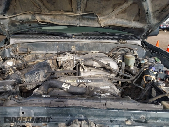 1999 Toyota 4Runner SR5 z VIN JT3GN86R4X0129944, wystawiony jako IAAI lot #41537597 z przebiegiem 361 416 mil mil oraz . Historia ofert i sprzedaży dostępna na DreamBid. Obrazek 10.