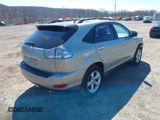 2008 Lexus RX with VIN 2T2HK31U98C071341, listed as a IAAI auction lot 41829229 with 166,031 mi miles. Bid and sale history available at carsss.com. Image 4.
