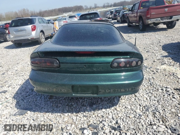 1997 Chevrolet Camaro z VIN 2G1FP22K6V2101185, wystawiony jako Copart lot #54356505 z przebiegiem 84 174 mil mil oraz Nie do naprawy • Non repairable. Historia ofert i sprzedaży dostępna na DreamBid. Obrazek 6.