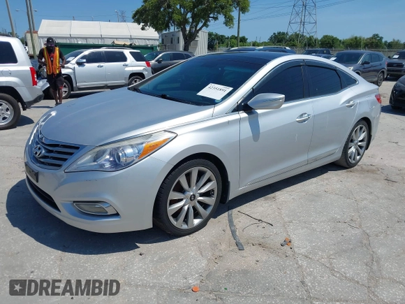 2013 Hyundai Azera with VIN KMHFH4JG6DA321882, listed as a IAAI auction lot 42351891 with 59,690 mi miles and . Bid and sale history available at DreamBid. Image 2.