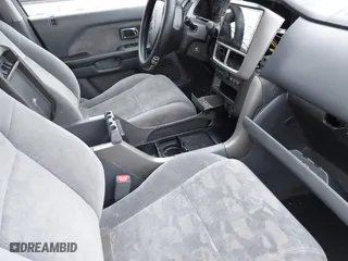 2004 Honda Pilot EX with VIN 2HKYF18494H525047, listed as a IAAI auction lot 41927610 with 999,999 mi miles. Bid and sale history available at carsss.com. Image 5.