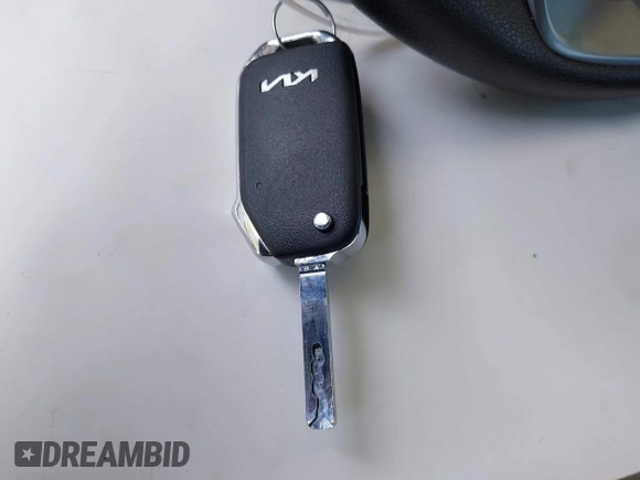 2023 Kia Forte LXS with VIN 3KPF24AD9PE578435, listed as a IAAI auction lot 41980894 with 59,817 mi miles and . Bid and sale history available at DreamBid. Image 11.