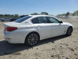 2018 BMW 5 Series 530e xDrive with VIN WBAJB1C51JG624259, listed as a Copart auction lot 57161285 with 133,463 mi miles and Clean title. Bid and sale history available at DreamBid. Image 3.