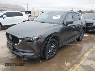 2021 Mazda CX-5 Touring with VIN JM3KFBCM0M0342210, listed as a IAAI auction lot 41236013 with 96,012 mi miles. Bid and sale history available at carsss.com. Image 20.