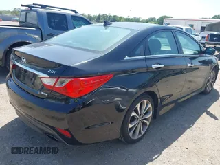 2014 Hyundai Sonata Limited with VIN 5NPEC4AB3EH841311, listed as a IAAI auction lot 42010642 with 148,558 mi miles and . Bid and sale history available at DreamBid. Image 4.