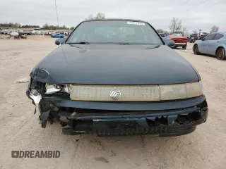 1995 Mercury Sable GS z VIN 1MELM50U3SA623819, wystawiony jako Copart lot #46957824 z przebiegiem 121 357 mil mil oraz Tytuł czysty. Historia ofert i sprzedaży dostępna na DreamBid. Obrazek 5.