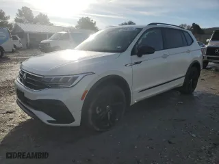 2023 Volkswagen Tiguan SE R-Line Black with VIN 3VVCB7AX8PM121086, listed as a Copart auction lot 45601555 with 27,571 mi miles and Salvage Title. Bid and sale history available at carsss.com. Image 1.