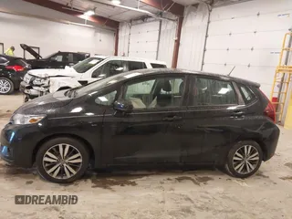 2015 Honda Fit EX-L with VIN 3HGGK5H84FM700823, listed as a IAAI auction lot 41488377 with 116,988 mi miles. Bid and sale history available at carsss.com. Image 14.