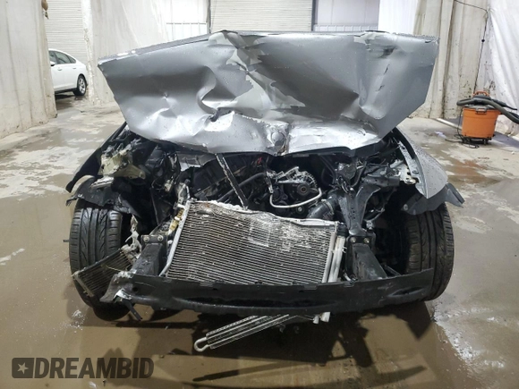 2012 BMW 3 Series 335i with VIN WBAKG7C52CE802607, listed as a Copart auction lot 82833794 with 0 mi miles and Salvage Title. Bid and sale history available at carsss.com. Image 5.