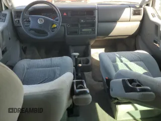 2002 Volkswagen EuroVan с VIN WV2KB47012H065431, выставлен на аукционе Copart как лот 49010445 с пробегом 78 985 миль миль и Чистый • Clean title. История ставок и продаж доступна на DreamBid. Изображение 8.