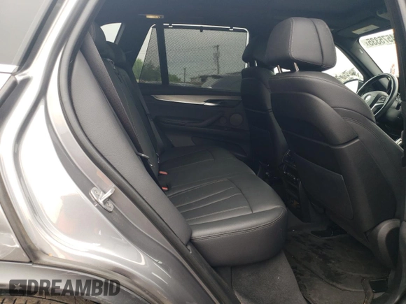 2017 BMW X5 xDrive50i with VIN 5UXKR6C30H0U13764, listed as a Copart auction lot 54575335 with 27,539 mi miles and Salvage title. Bid and sale history available at DreamBid. Image 11.