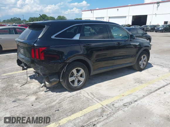 2021 Kia Sorento LX with VIN 5XYRG4LCXMG022068, listed as a IAAI auction lot 42674184 with 112,163 mi miles and . Bid and sale history available at DreamBid. Image 4.