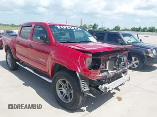 2014 Toyota Tacoma with VIN 3TMLU4EN1EM164374, listed as a IAAI auction lot 42713470 with 117,653 mi miles and . Bid and sale history available at DreamBid. Image 1.