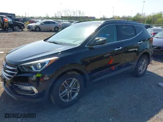 2018 Hyundai Santa Fe Sport 2.4L with VIN 5NMZUDLB6JH073309, listed as a IAAI auction lot 42016586 with 90,933 mi miles. Bid and sale history available at carsss.com. Image 2.