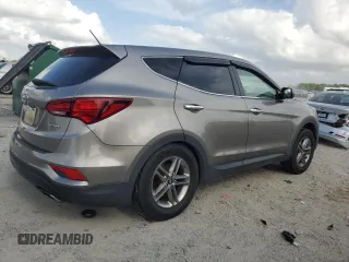 2018 Hyundai Santa Fe 2.4L z VIN 5NMZT3LB7JH080380, wystawiony jako Copart lot #54016805 z przebiegiem 138 494 mil mil oraz Nie do naprawy • Non repairable. Historia ofert i sprzedaży dostępna na DreamBid. Obrazek 3.