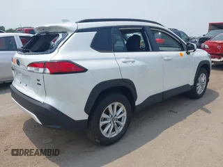 2023 Toyota Corolla Cross LE with VIN 7MUCAABG5PV070262, listed as a IAAI auction lot 42347876 with 24,449 mi miles and . Bid and sale history available at DreamBid. Image 4.