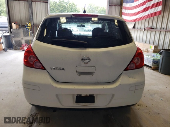2009 Nissan Versa 1.8 S with VIN 3N1BC13E09L496658, listed as a Copart auction lot 67597234 with 125,854 mi miles and Salvage Title. Bid and sale history available at carsss.com. Image 6.