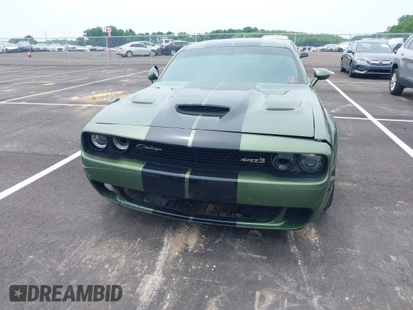 2021 Dodge Challenger R/T Scat Pack z VIN 2C3CDZFJ2MH559741, wystawiony jako IAAI lot #42264991 z przebiegiem 51 040 mil mil oraz . Historia ofert i sprzedaży dostępna na DreamBid. Obrazek 12.