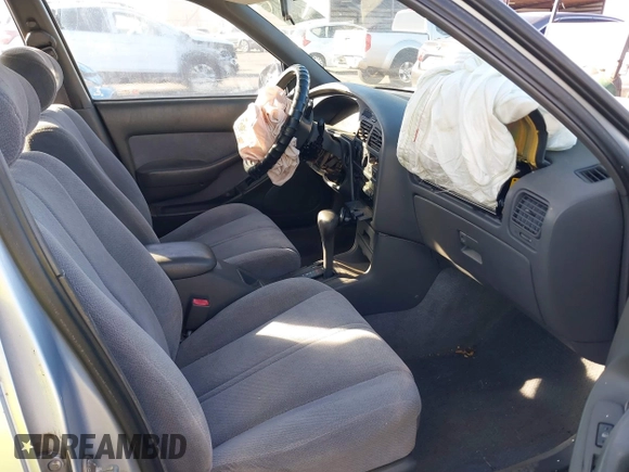 1995 Toyota Camry LE z VIN 4T1GK12W1SU100177, wystawiony jako IAAI lot #41338427 z przebiegiem 128 733 mil mil oraz . Historia ofert i sprzedaży dostępna na DreamBid. Obrazek 5.