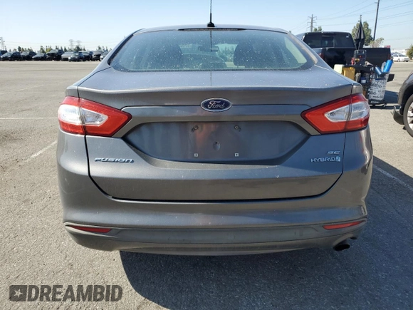 2013 Ford Fusion SE Hybrid z VIN 3FA6P0LU0DR274279, wystawiony jako Copart lot #57462315 z przebiegiem 272 825 mil mil oraz Szkoda całkowita • Salvage title. Historia ofert i sprzedaży dostępna na DreamBid. Obrazek 6.