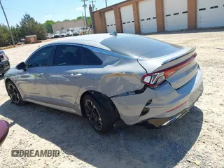 2022 Kia K5 GT-Line z VIN 5XXG64J23NG156401, wystawiony jako IAAI lot #42051123 z przebiegiem 71 853 mil mil oraz . Historia ofert i sprzedaży dostępna na DreamBid. Obrazek 14.