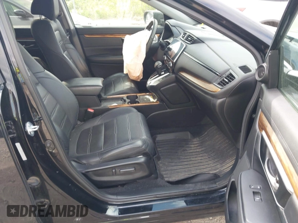2021 Honda CR-V Touring with VIN 5J6RW2H92ML003064, listed as a IAAI auction lot 42298361 with 70,988 mi miles and . Bid and sale history available at DreamBid. Image 5.