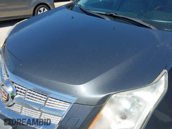 2011 Cadillac SRX Premium Collection with VIN 3GYFNFEY9BS601541, listed as a IAAI auction lot 41950409 with 168,358 mi miles. Bid and sale history available at carsss.com. Image 13.
