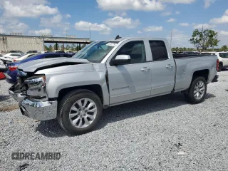 2018 Chevrolet Silverado 1500 LT with VIN 1GCRCREC1JZ354936, listed as a Copart auction lot 50747775 with 129,362 mi miles and Salvage Title. Bid and sale history available at DreamBid. Image 1.