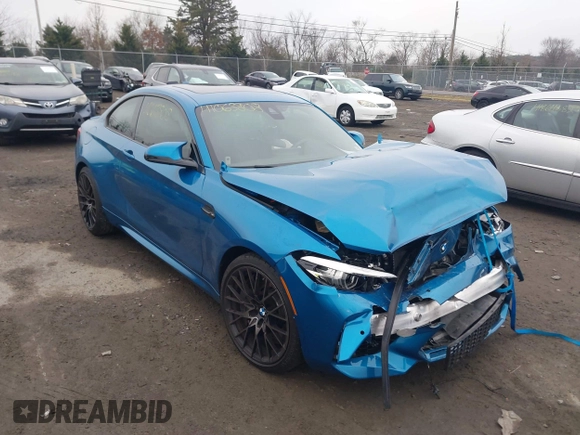 2021 BMW M2 Competition z VIN WBS2U7C02M7H63454, wystawiony jako IAAI lot #41063808 z przebiegiem 15 047 mil mil oraz . Historia ofert i sprzedaży dostępna na DreamBid. Obrazek 1.