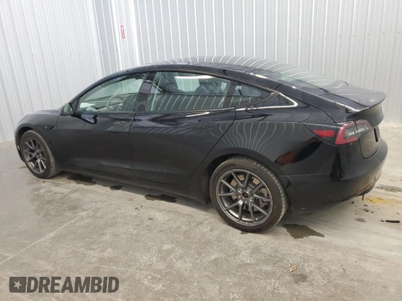 2022 Tesla Model 3 z VIN 5YJ3E1EA1NF188851, wystawiony jako Copart lot #59259325 z przebiegiem 142 223 mil mil oraz Czysty tytuł • Clean title. Historia ofert i sprzedaży dostępna na DreamBid. Obrazek 2.