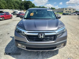 2017 Honda Ridgeline RTL-E with VIN 5FPYK3F79HB031142, listed as a Copart auction lot 62365885 with 134,517 mi miles and Salvage title. Bid and sale history available at DreamBid. Image 5.