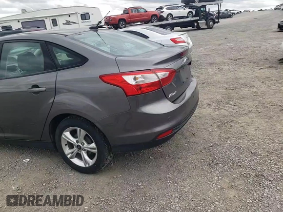 2013 Ford Focus SE with VIN 1FADP3F21DL320932, listed as a Copart auction lot 55031435 with 133,444 mi miles and Salvage title. Bid and sale history available at DreamBid. Image 11.