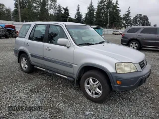 1999 Honda CR-V EX with VIN JHLRD1866XC074271, listed as a Copart auction lot 68741914 with 296,297 mi miles and Salvage Title. Bid and sale history available at carsss.com. Image 4.