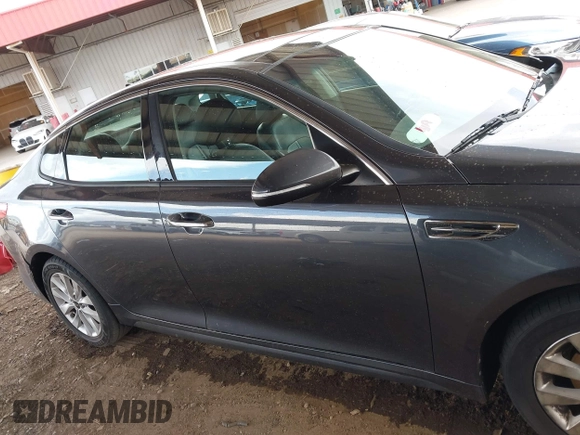 2017 Kia Optima EX with VIN 5XXGU4L36HG125627, listed as a IAAI auction lot 41949580 with 123,548 mi miles. Bid and sale history available at carsss.com. Image 13.
