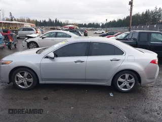 2012 Acura TSX Tech Pkg with VIN JH4CU2F62CC012290, listed as a IAAI auction lot 40765338 with 129,737 mi miles. Bid and sale history available at carsss.com. Image 14.