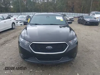 2015 Ford Taurus SHO with VIN 1FAHP2KT7FG148444, listed as a IAAI auction lot 40788614 with 121,533 mi miles and . Bid and sale history available at DreamBid. Image 12.