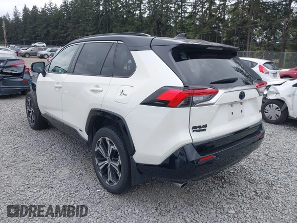 2022 Toyota RAV4 XSE with VIN JTMEB3FV1ND100256, listed as a IAAI auction lot 42127288 with 30,367 mi miles and . Bid and sale history available at DreamBid. Image 3.