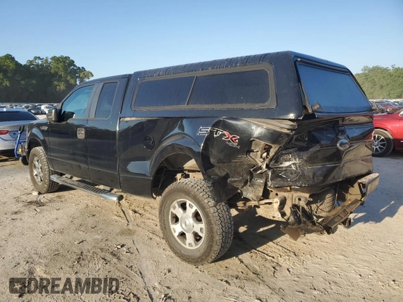 2009 Ford F-150 STX with VIN 1FTRX14W69FA23543, listed as a Copart auction lot 52314695 with 149,268 mi miles and Salvage Title. Bid and sale history available at DreamBid. Image 2.