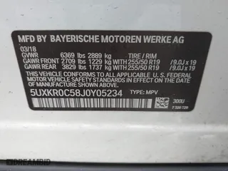 2018 BMW X5 xDrive35i with VIN 5UXKR0C58J0Y05234, listed as a IAAI auction lot 41957904 with 125,658 mi miles. Bid and sale history available at carsss.com. Image 9.