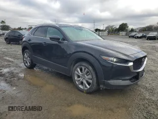 2022 Mazda CX-30 S Premium with VIN 3MVDMBDL7NM443738, listed as a Copart auction lot 48970255 with 20,675 mi miles and Salvage Title. Bid and sale history available at carsss.com. Image 4.