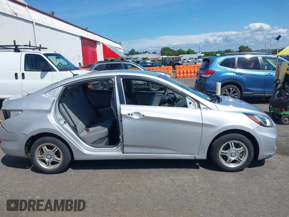 2012 Hyundai Accent GLS with VIN KMHCU4AEXCU241639, listed as a IAAI auction lot 42327411 with 108,939 mi miles and . Bid and sale history available at DreamBid. Image 14.