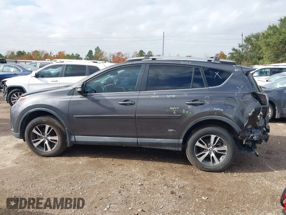 2018 Toyota RAV4 XLE with VIN 2T3WFREV4JW417555, listed as a IAAI auction lot 41092589 with 93,788 mi miles and . Bid and sale history available at DreamBid. Image 15.