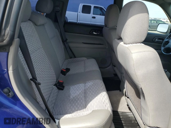 2003 Subaru Forester XS z VIN JF1SG65633H749522, wystawiony jako Copart lot #53393445 z przebiegiem 138 592 mil mil oraz Szkoda całkowita • Salvage title. Historia ofert i sprzedaży dostępna na DreamBid. Obrazek 10.