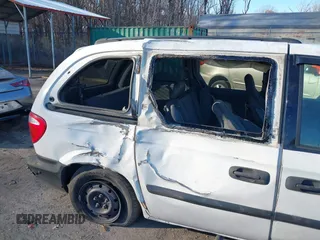 2005 Dodge Caravan SE with VIN 1D4GP25R45B305819, listed as a IAAI auction lot 41011300 with 229,466 mi miles and . Bid and sale history available at carsss.com. Image 6.