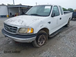 2001 Ford F-150 XL z VIN 1FTRX17L11NB54097, wystawiony jako IAAI lot #42353176 z przebiegiem 258 729 mil mil oraz . Historia ofert i sprzedaży dostępna na DreamBid. Obrazek 2.